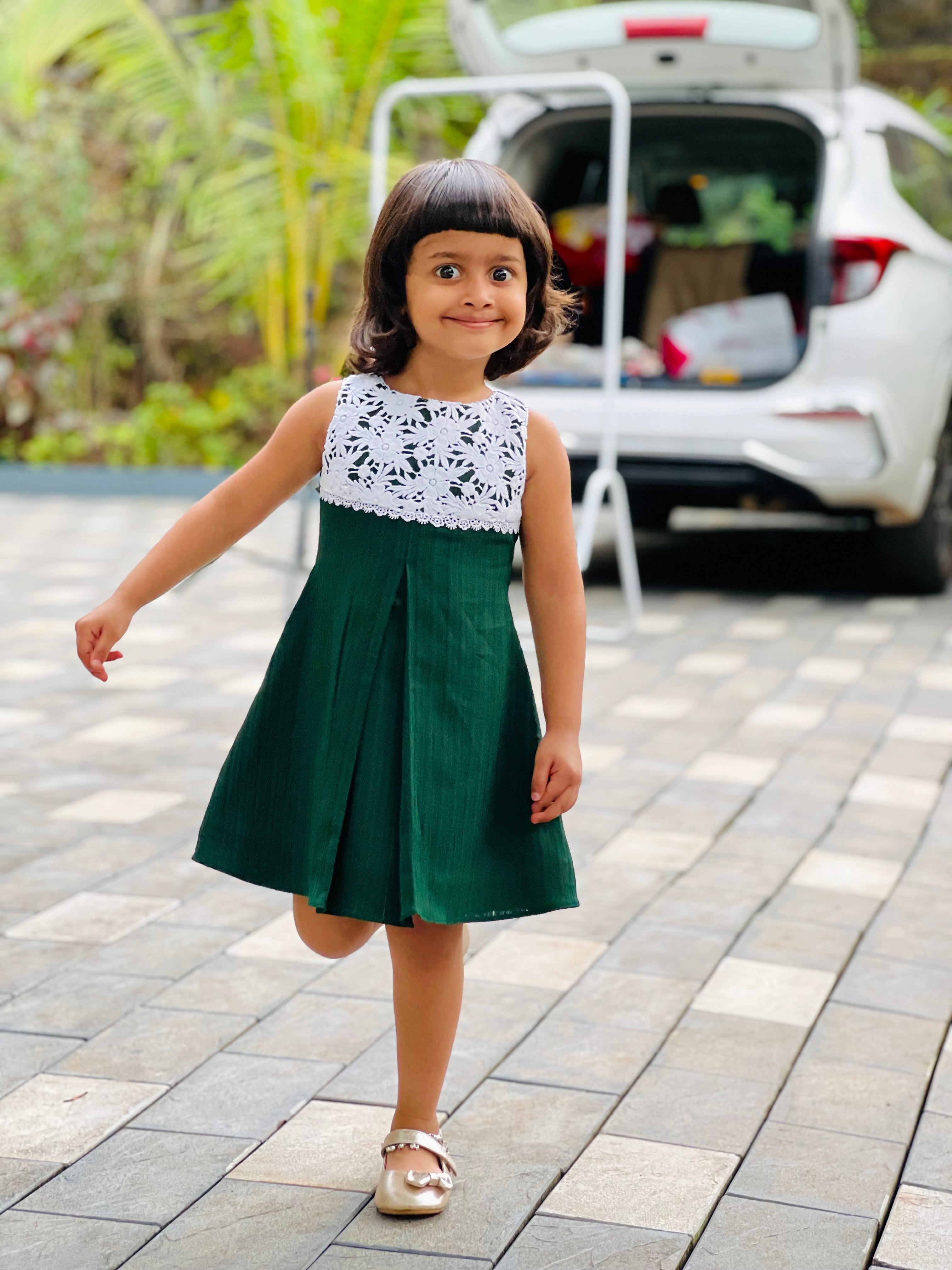 “Twirling into the day with a dash of green elegance! 💚🤍”