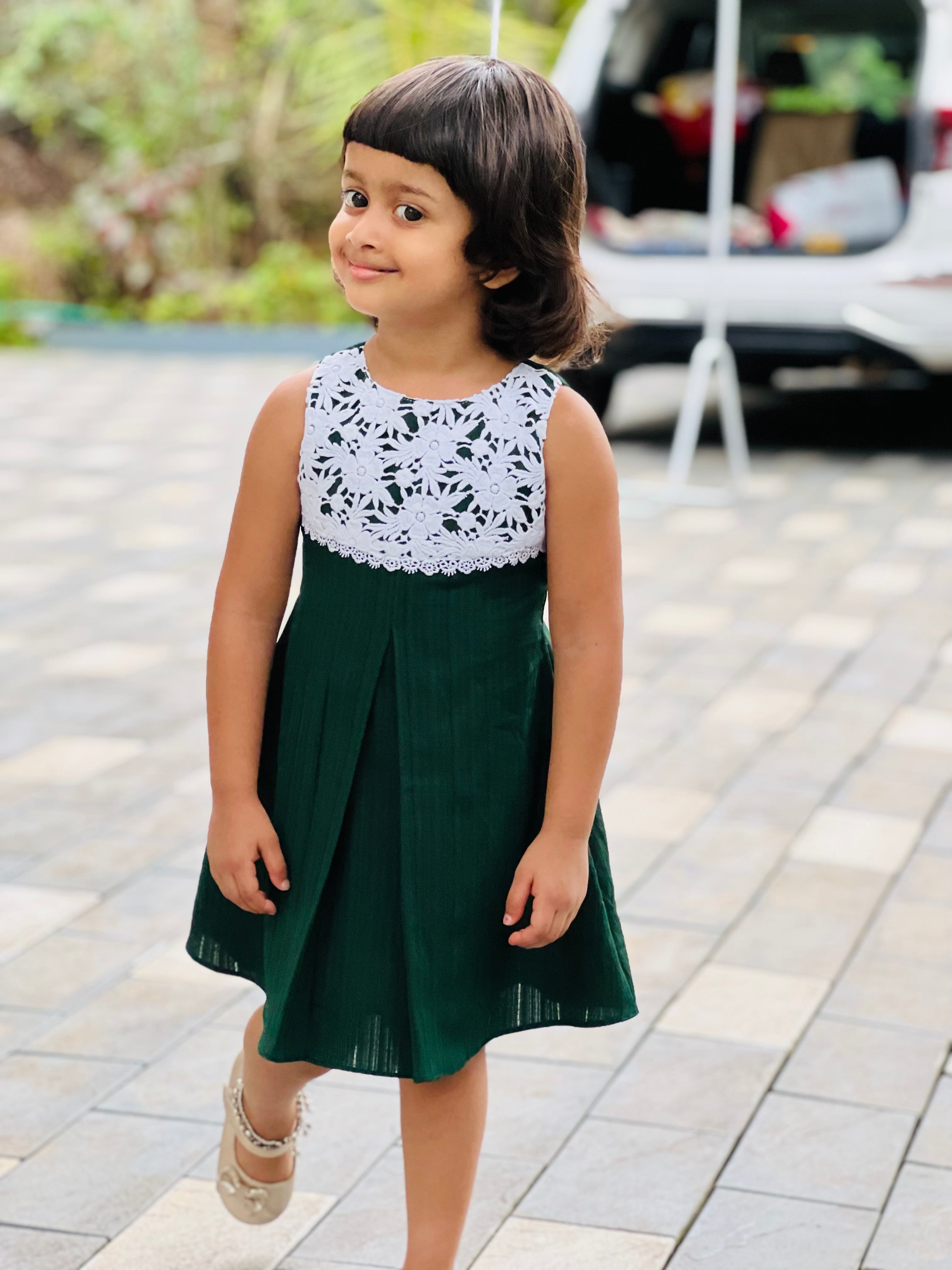 “Twirling into the day with a dash of green elegance! 💚🤍”